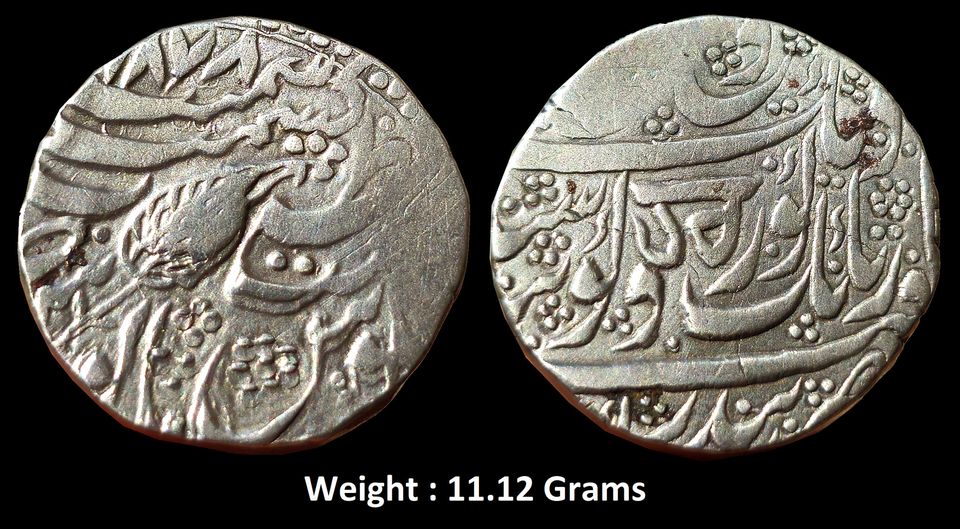 Independent Kingdom ; Sikh Empire ;
Governor Hari Singh Nalwa (1820-1821 AD), Mint : Khitta Kashmir ;
Extremey Rare Silver Rupee, "Gobind Shahi" Couplet, 1878 VS
Obv: Persian legend "deg tegh fath nusrat be dirang, yaft az nanak guru Gobind Singh", with Gurmukhi 'HAR' for Hari Singh Nalwa,
Rev: Persian legend "sana julus manus memanat" & "zarb Khitta Kashmir" at the top with leaf mintmark,
Weight : 11.12 Grams , 22.92mm, (KM # 46.4/Herrli-06.05.04), Extremely Rare

Note: Some rupees struck in Kashmir under Hari Singh Nalwa in VS 1878 & 1879 bear the words “HAR”or “HARJI” in the Gurumukhi or Nagari scripts. These coins probably gave rise to the widespread belief that Maharaja Ranjit Singh authorized his governor in Kashmir to strike coins in his own name.

Note : Full dated specimen is hard to get .