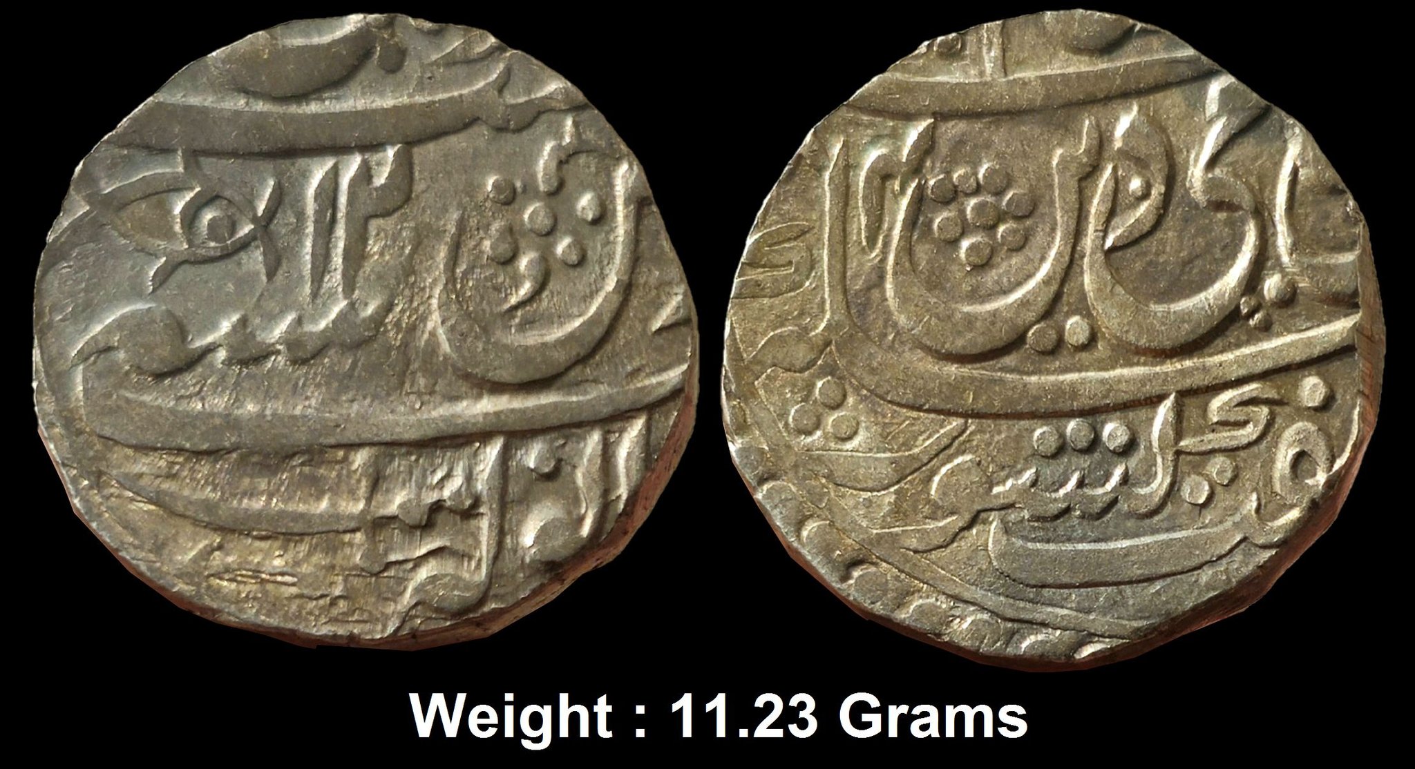 Independent Kingdom;
Hafiz Rahmat Khan, Silver Rupee,
Anwala (Anola) Mint, in the name of Shah Alam II, RY 12, fish with whiskers as mint mark on rev along with sword symbol before mint name at bottom. (KM 16.3). About Extremely Fine, Rare.