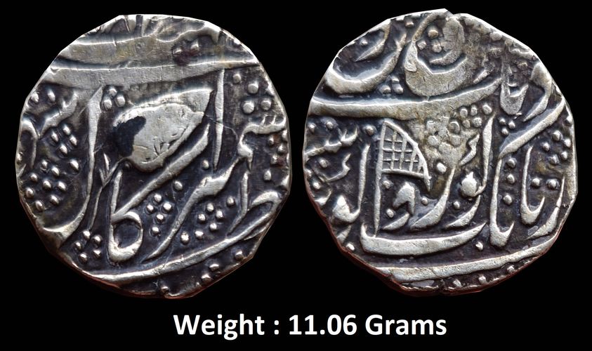 Independent Kingdom ; Sikh Empire,
Governor Diwan Moti Ram, Kashmir Mint, Silver Rupee, 'Gobind Shahi' Couplet,
Obv: deg tegh o fath nusrat be-dirang yaft az nanak guru gobind singh, flag & beaded flower, Rev: zarb kashmir, vs date & leaf,
Weight : 11.06 Grams ; (Herrli # 06.15.04)
Extremely fine ; Very Rare.