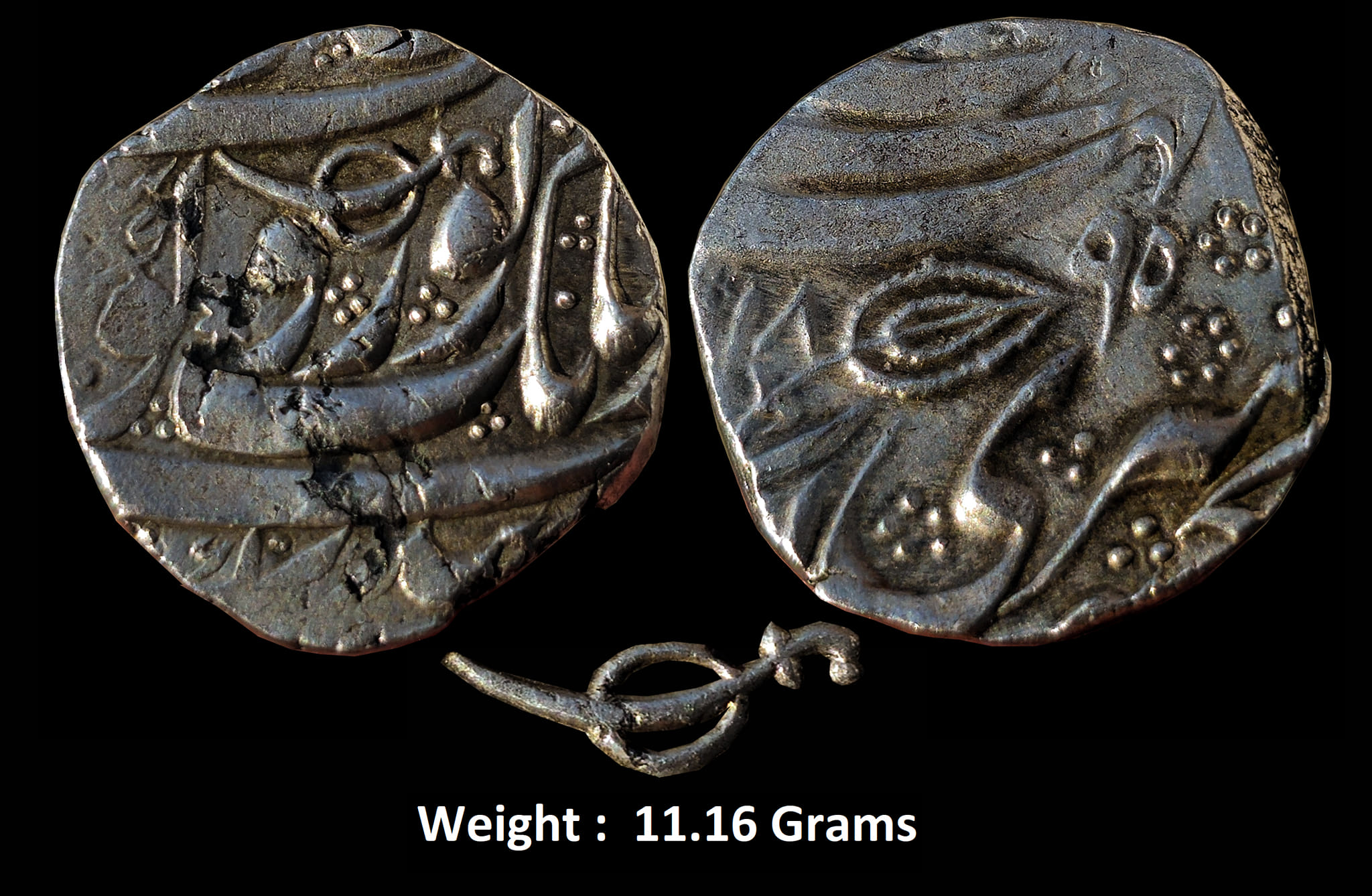 Independent Kingdom ; Sikh Empire , Silver Rupee ; Kashmir mint ; 1895 VS ;
Governor Mihan Singh Kumedan ;
Note : Silver rupee with a sword and shield symbol on the obverse and a leaf on the reverse. The sword and shield symbol represents Governor Mihan Singh,
Inscription: Gobindshahi couplet.

Obv : (in Persian) Deg o tegh o fath o nusrat bedrang Yaft az Nanak Guru Gobind Singh Translation: Abundance, power and victory [and] assistance without delay are the gift of Nanak [and] Guru Gobind Singh.
Rev : (in Persian) Zarb Kashmir Sri Akal Pur Jib Translation: Struck in Kashmir, in the city of the timeless One.