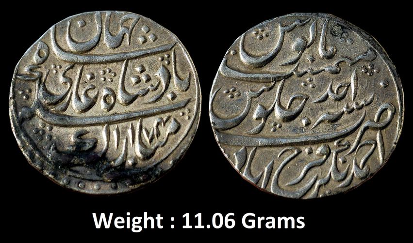 Mughal ; Shah Jahan III ; Rare Silver Rupee
Mint : Ahmadnagar Farrukhabad Mint,
AH 1174 /Ahad RY, INO Shah Jahan III,
Obv: Persian legend "Sikka Mubarak Badshah Ghazi Shahjahan",
Rev: Persian legend "sana ahad julus" & "zarb Ahmadnagar Farrukhabad" at the bottom, Weight : 11.06 Grams ; 28.55mm, (KM # 16), Extremely fine, Rare.