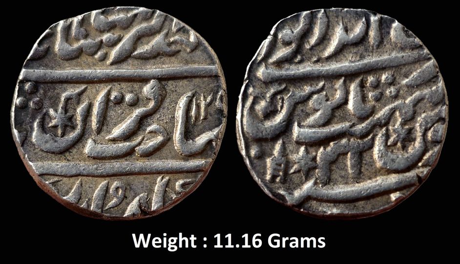 IPS ; Bharatpur State ; Silver Rupee
Mint : Brijendrapur ; INO Akbar II ; RY 32 ;
Weight : 11.16 Grams ; 129X AH