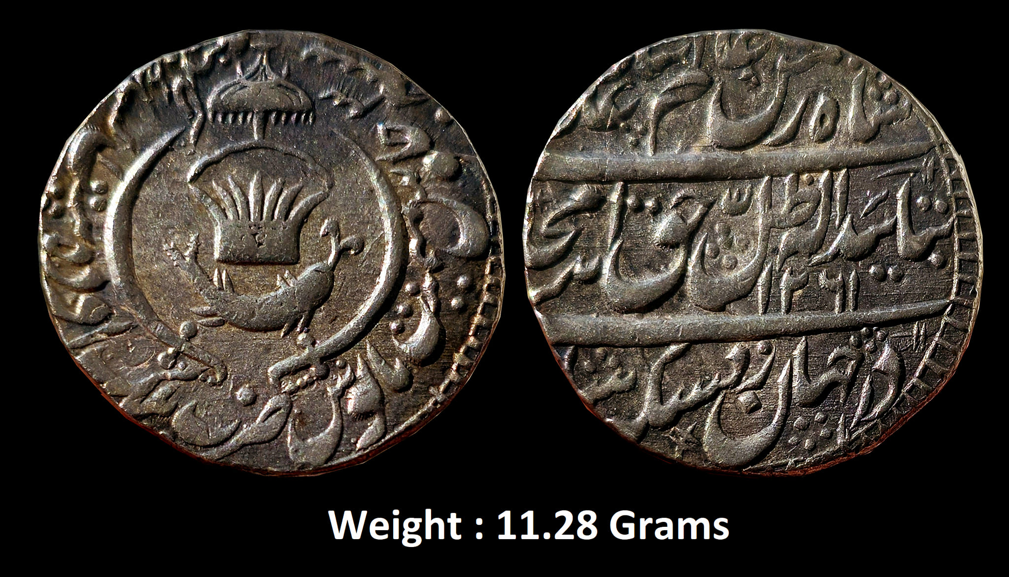 Awadh State ; Amjad Ali Shah ; High Grade Silver Rupee ; AH 1261/ 3
Mint : Mulk Awadh Bait us-Sultanat Lakhnau ( Full Mint ) ,
Note : Parasol above crown and fish flanked by curved swords on obv.,