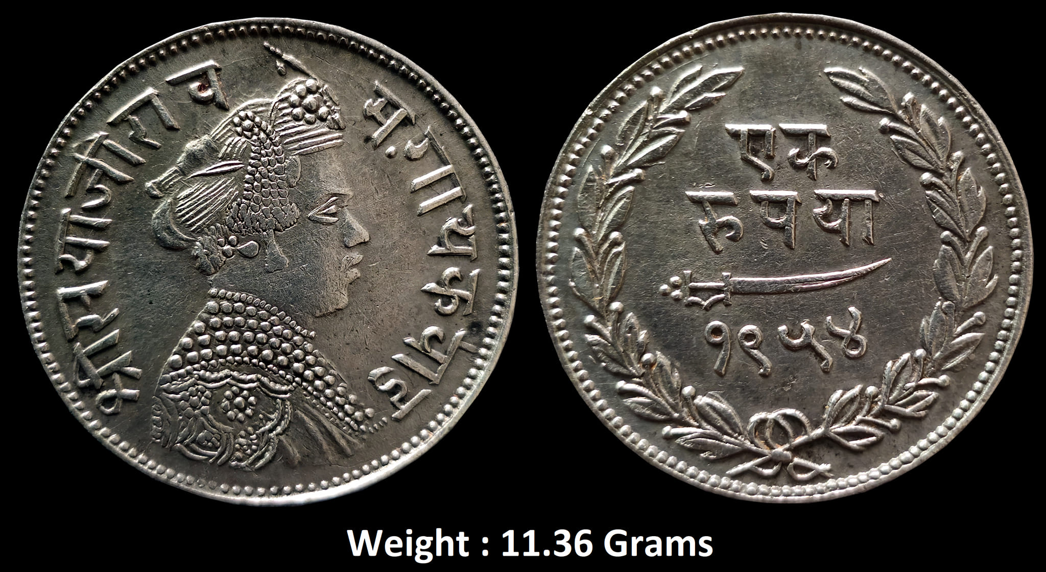 princely-state-baroda-sayaji-rao-iii-high-grade-silver-rupee-broad-flan-about-very-fine-rare.jpg PRINCELY STATE - BARODA Sayaji Rao III, High Grade Silver Rupee, Broad flan, VS 1954 (KM Y36). About Very Fine. Rare