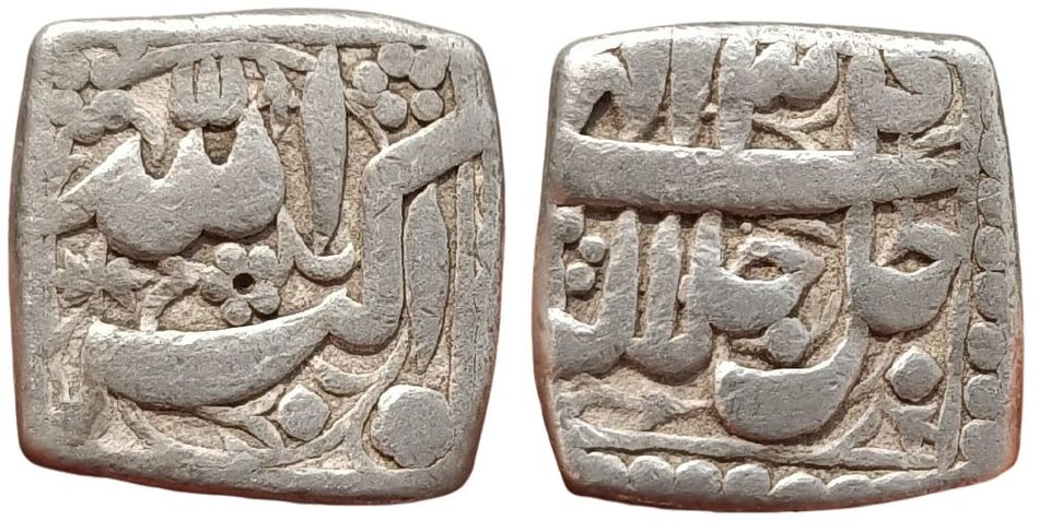 mughal-akbar-silver-rupee-mintless-and-monthless-ilahi-type.jpg Mughal ; Akbar, Silver Rupee, 11.32g, Mintless and Monthless, Ilahi type, Year 34 (KM A91.1).