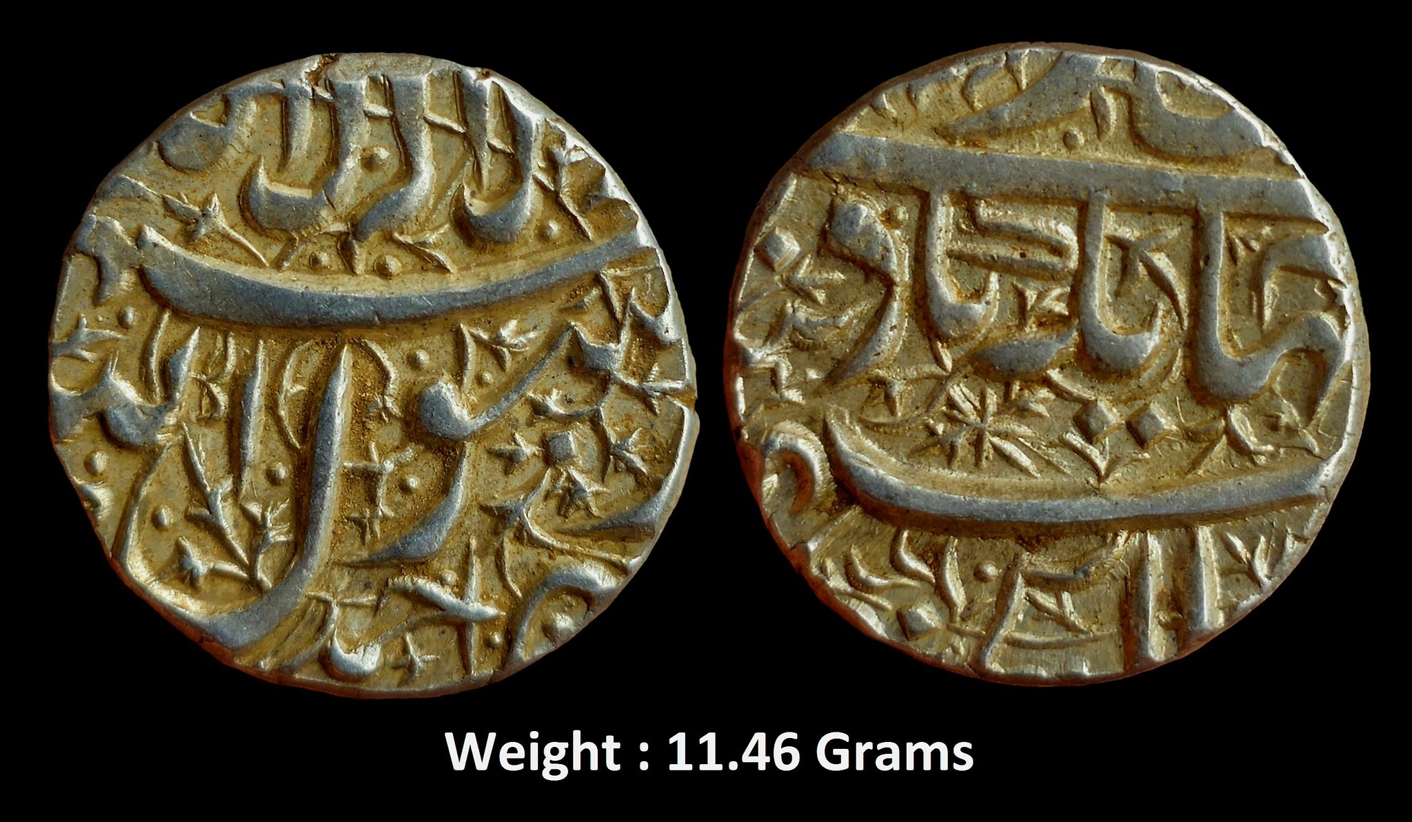 mughal-jahangir-high-grade-ornamental-silver-rupee-mint-ahmednagar.jpg Mughal ; Jahangir ; High Grade Ornamental Silver Rupee ; Mint : Ahmednagar ;Kalima on obv. (KM 141.1) ; Extremely Fine.