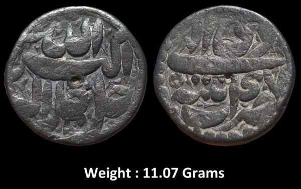 Mughal ; Akbar ; Large Flan Silver Rupee ;Mint : Patna ( Full Mint ) ; Ilahi type ; Month : Di ; Year 47 (KM 93.14) ; Very Fine ; Rare