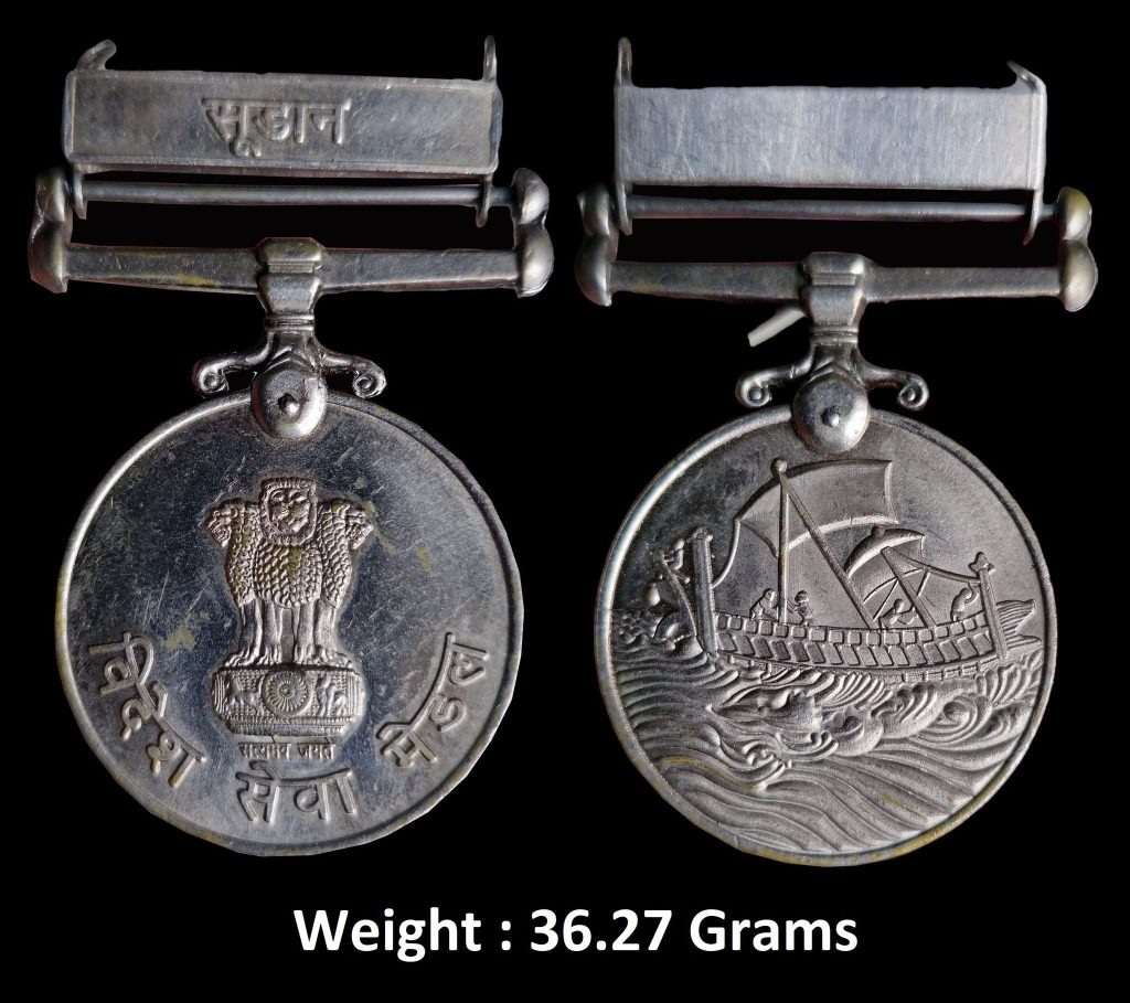 Medal ; Videsh Seva Medal with Sudan Clasp ; Indian Military Overseas Service Decoration ; Established: 1960 ; Material: Cupro-nickel ; Diameter : Approx35 mm ; Clasp: Sudan, inscribed in Hindi ; Awarded for Qualifying service outside India