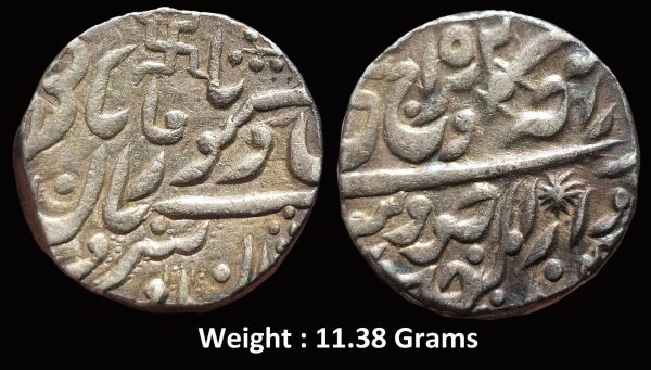 Princely State ; Jodhpur ; Silver Rupee ; Issued in the name of Maharaja Takht Singh & Queen Victoria ; Mint : Dar al-Mansur Jodhpur (pseudo) - Pali ; Mintmark : Swastika, Jhar + Sword